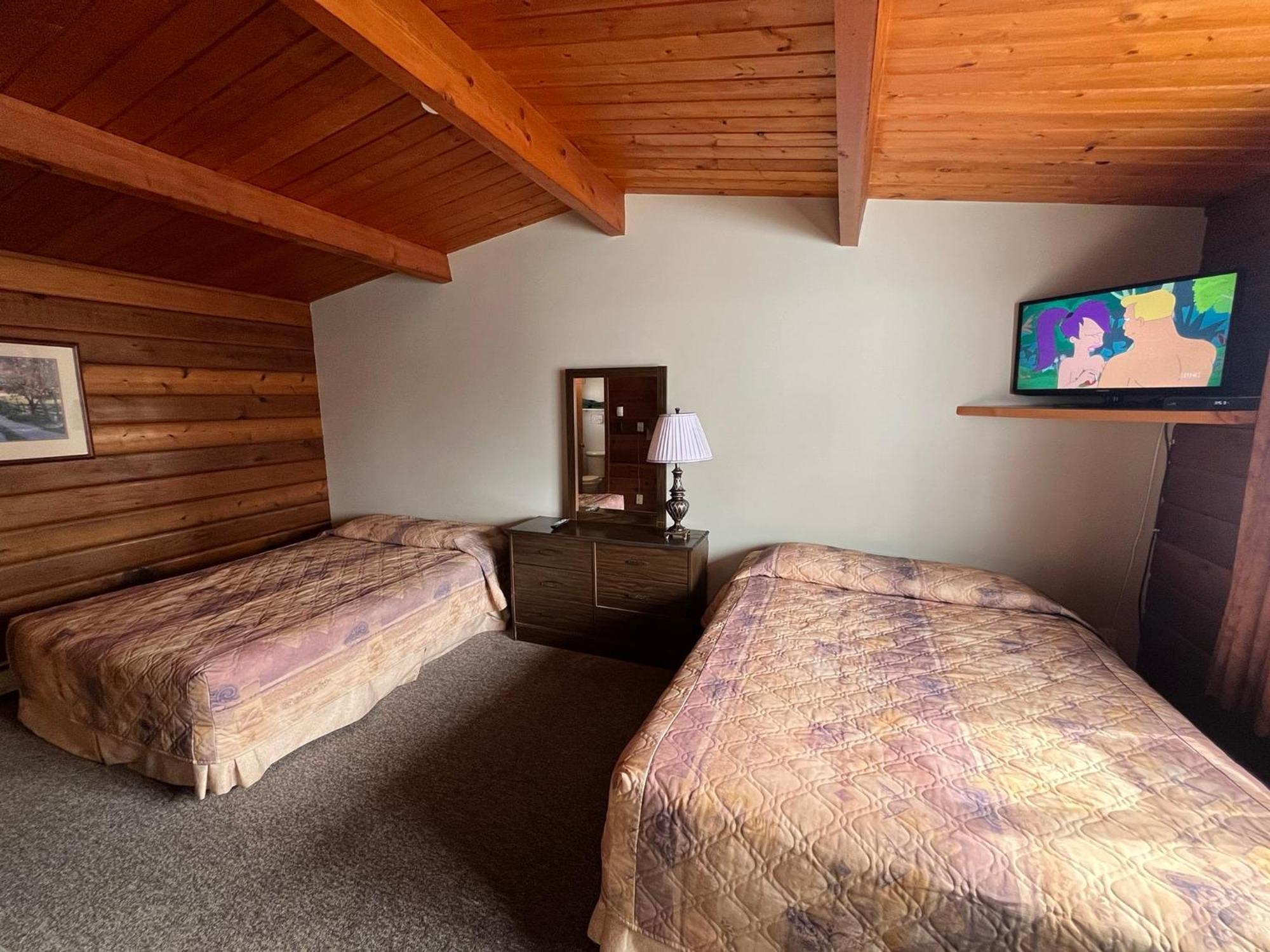 Raccoon Lodge Motel Sylvan Lake Kültér fotó